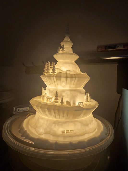 Handmade alpine holiday ornament glowing with optional LED light (batteries not included)